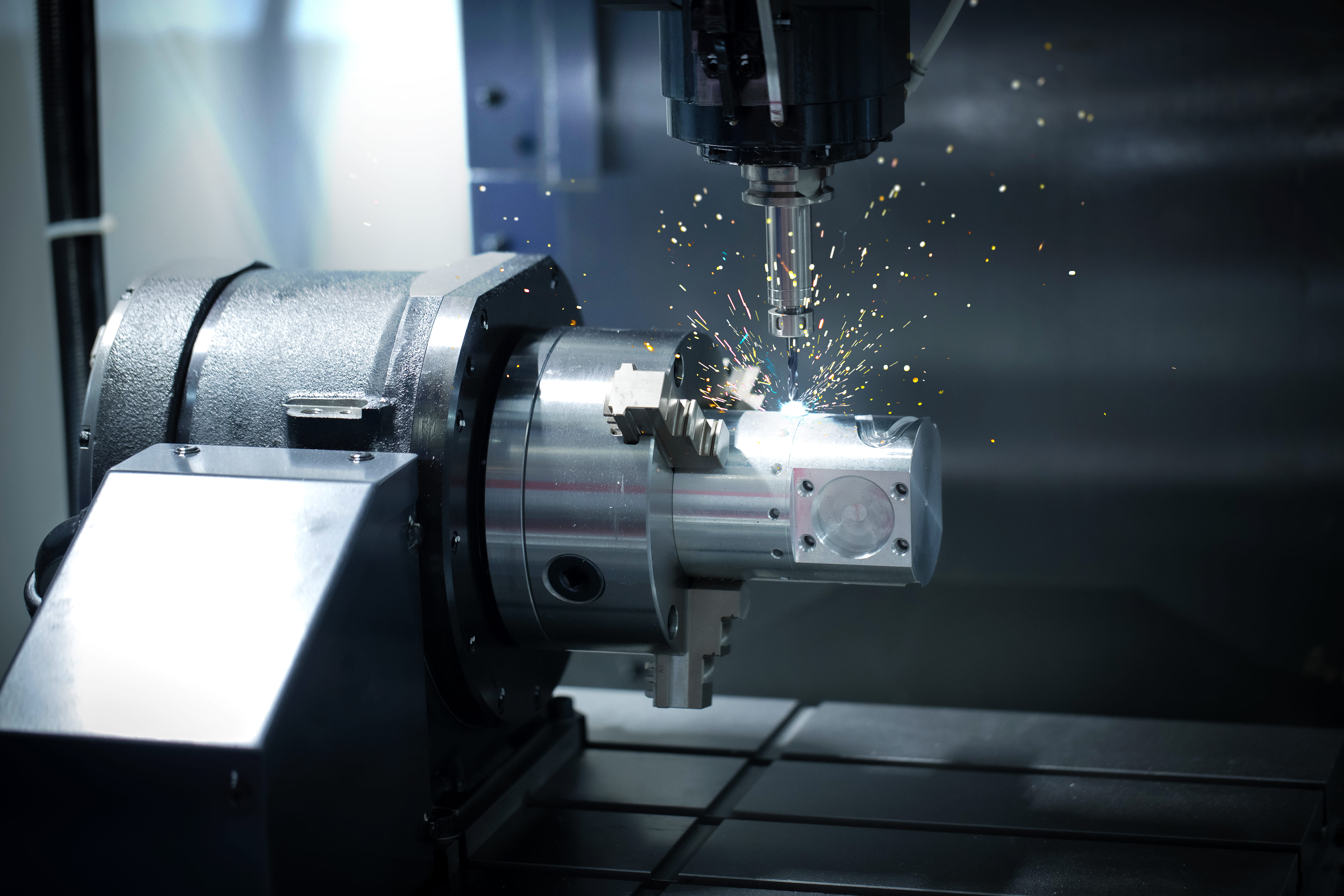 CNC machine cutting a metal component