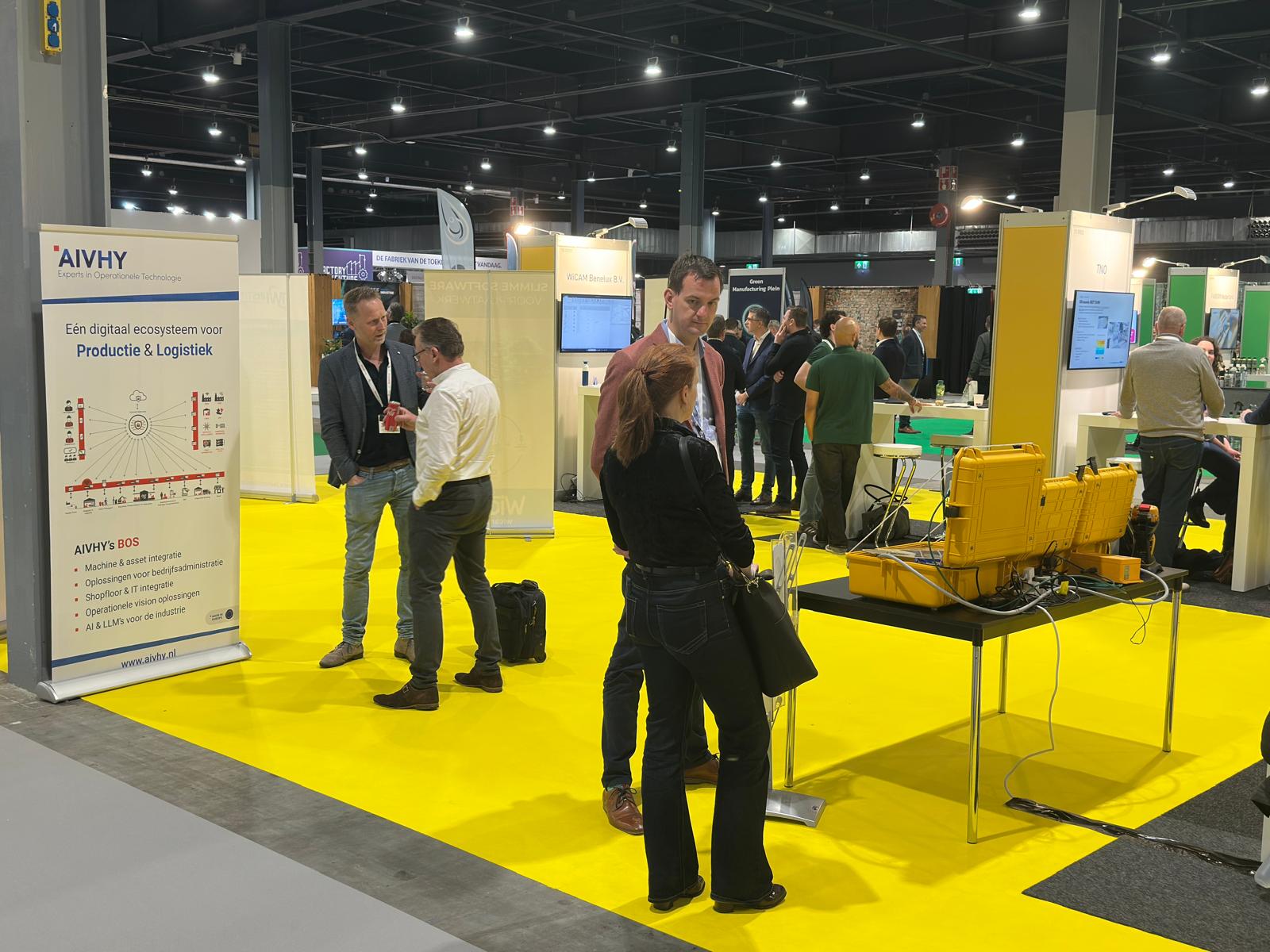 The Aivhy team presenting its industrial technology at a trade show.